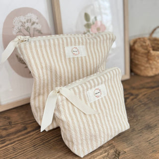 Trousse à cosmétiques à rayures beige et blanches