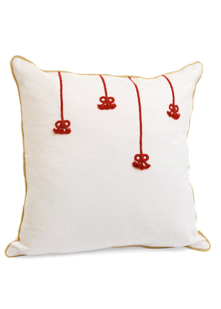 Coussin décoratif brodé – Boucles rouges