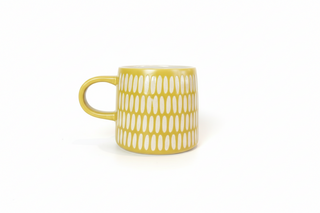 Tasse en céramique motif géométrique ocre