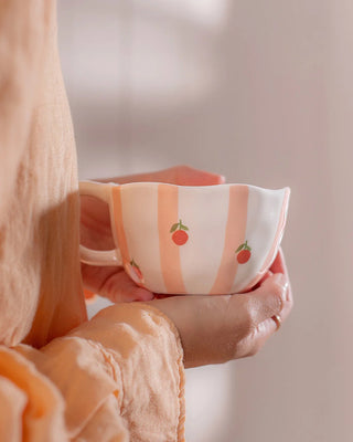 Tasse en céramique – Rayures et oranges
