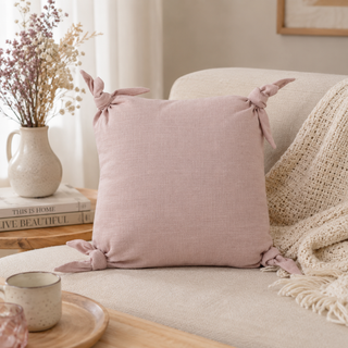 Coussin noeuds rose